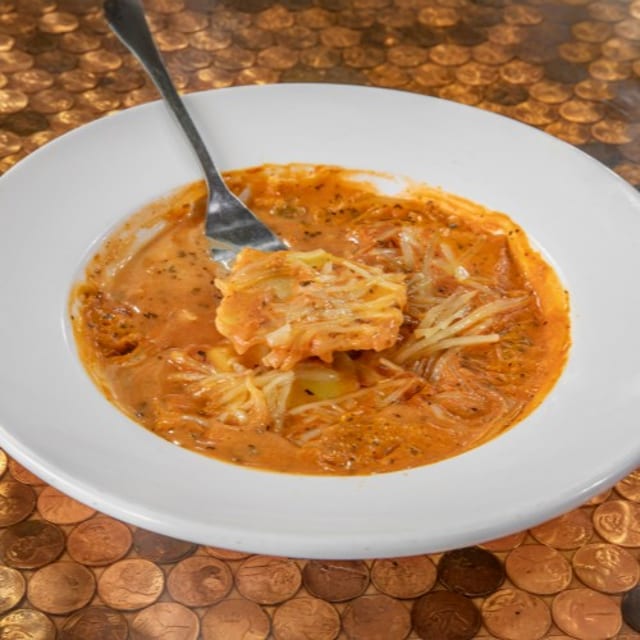 Large Four Cheese Ravioli.